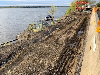 12-foot retaining wall blocking lake access