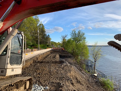dug12-foot retaining wall blocking lake access